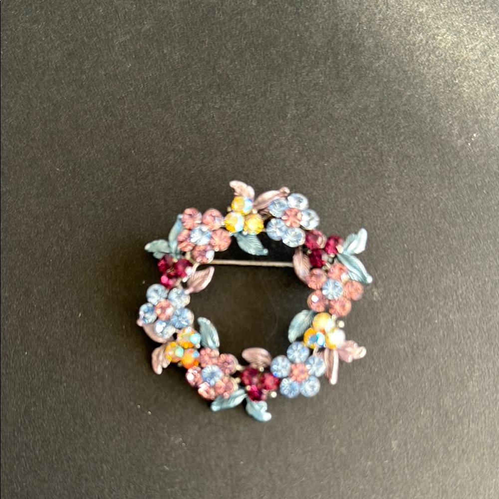 Vintage Blue and Pink Brooch with Intricate Wreath Design
